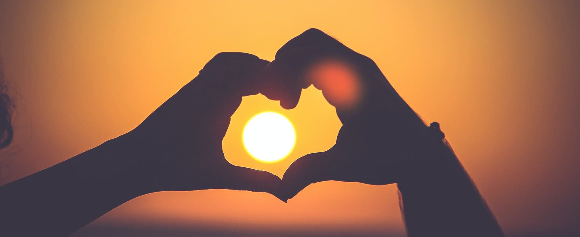 couple holding hands in heart shape couple holding hands in heart shape