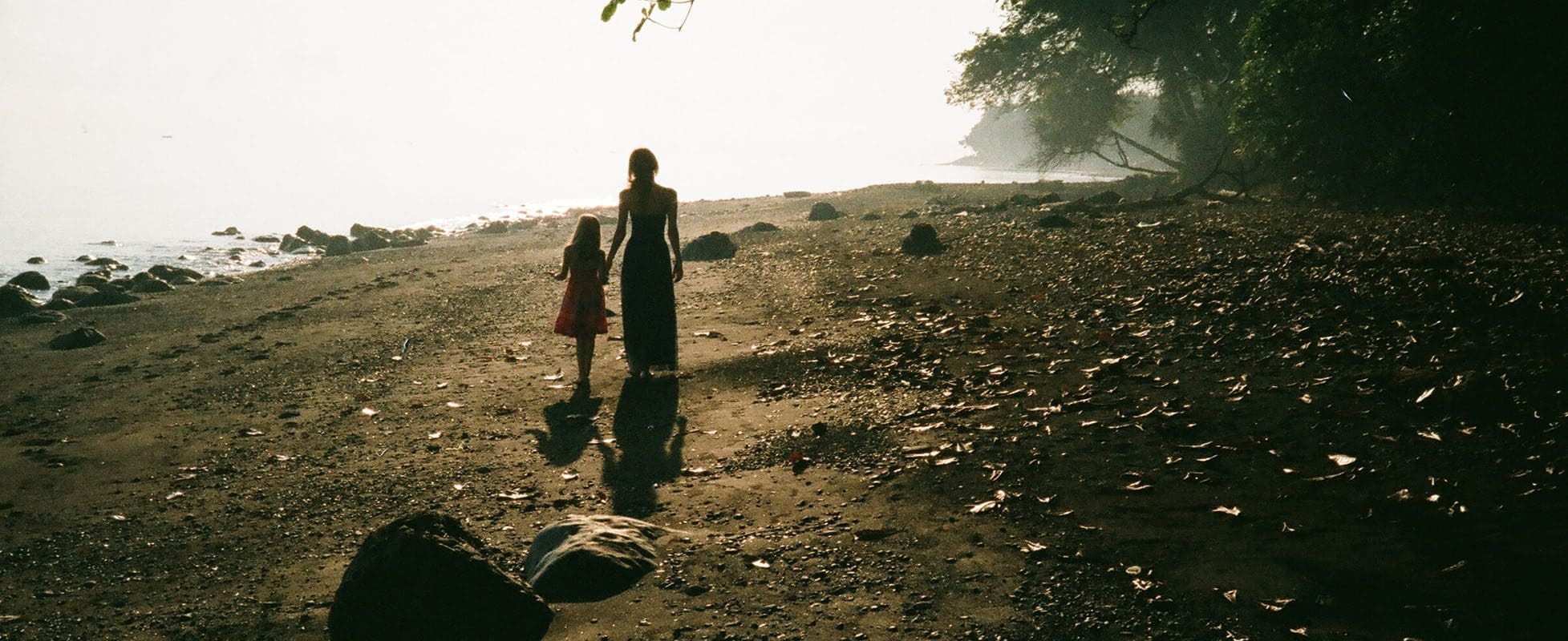 mother and child walking up hill mother and child walking up hill