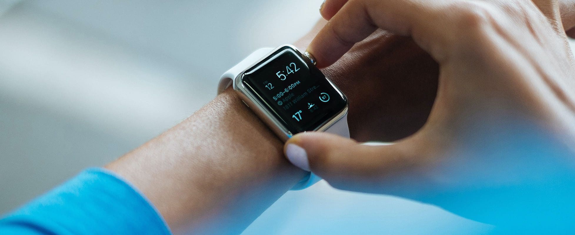 person checking heart rate on watch person checking heart rate on watch